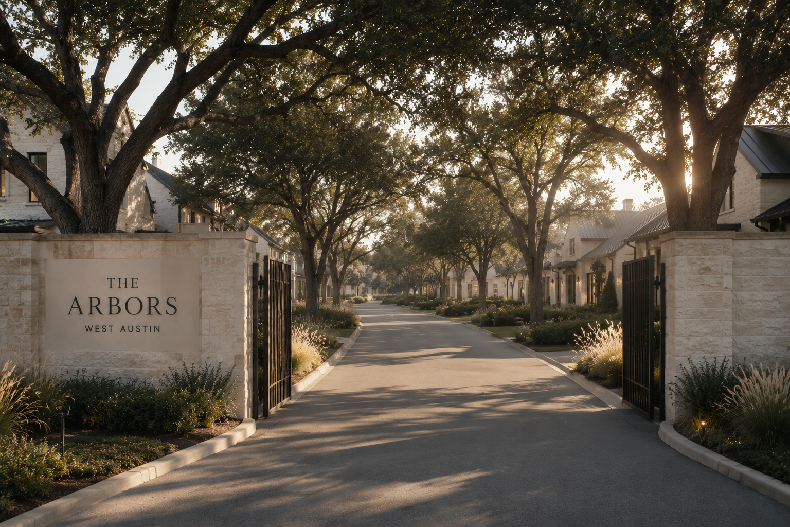 The Arbors gated entry beneath the oaks at dusk
